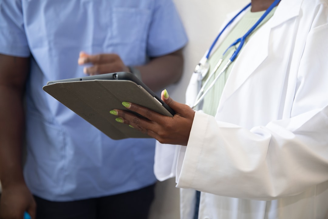 Healthcare professional discussing care with a patient